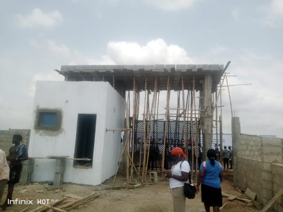 A fenced and gated plot of land in a serene environment. 4 A fenced and gated plot of land in a serene environment.