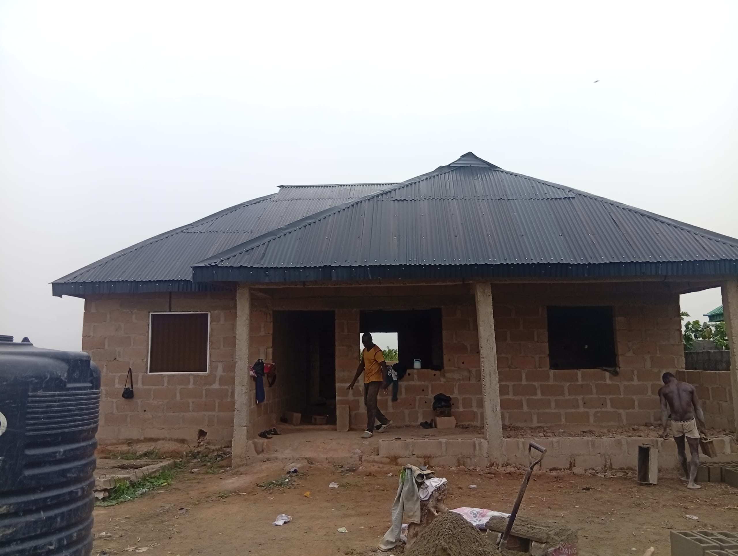 Full plot of land with semi-completed 3 bedroom building