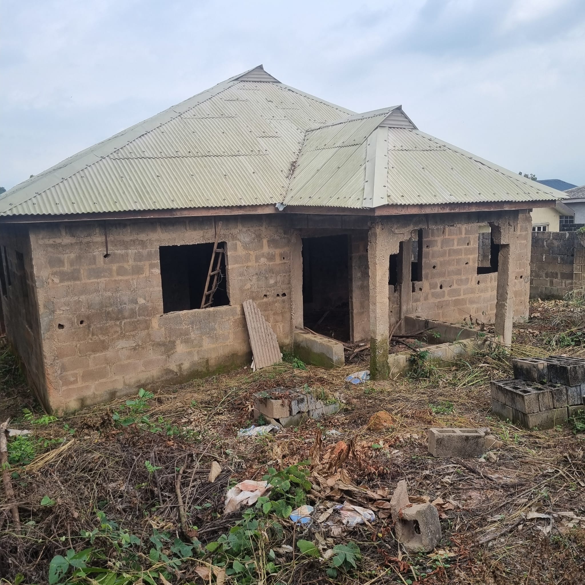 A Plot of Land with uncompleted structure of 2 wings of 3 bedrooms flat for Sale