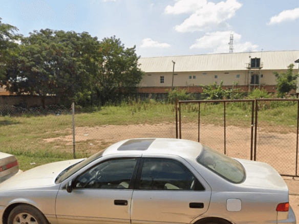 Prime Commercial Land with C of O opposite Gwagwalada Main Market