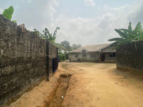 Almost 2 plots of land (907sqm) with 5-bedroom bungalow for sale
